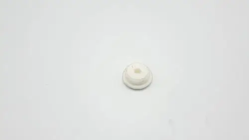 Weißes Kunststoffteil, möglicherweise eine Luftkappe, auf neutralem Hintergrund. Hersteller könnte Remeha sein.